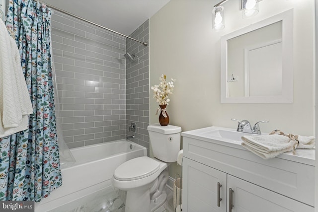 full bathroom with vanity, toilet, and shower / tub combo