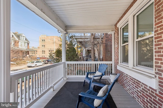 balcony featuring covered porch