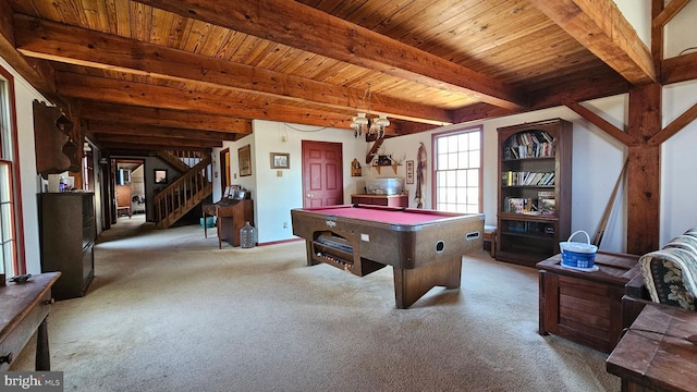 game room with a chandelier, billiards, wood ceiling, carpet flooring, and beam ceiling