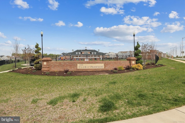 surrounding community featuring a playground and a lawn