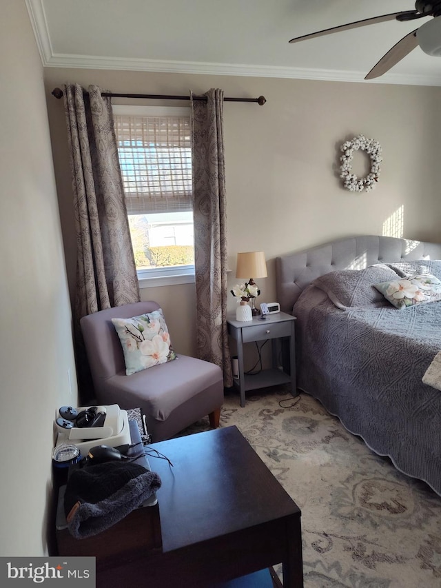 bedroom featuring crown molding and ceiling fan