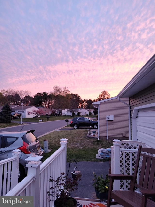 view of yard at dusk