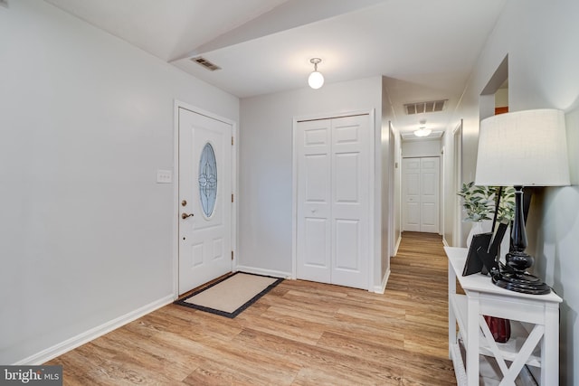 foyer featuring light wood-type flooring