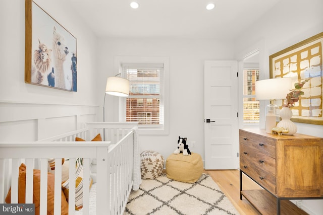 bedroom featuring light wood-type flooring