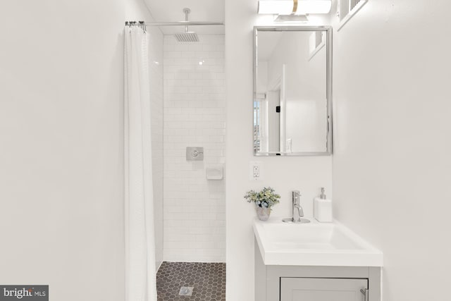 bathroom with vanity and curtained shower