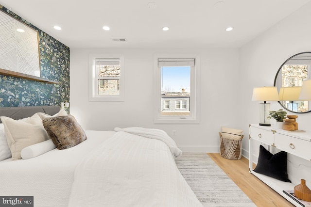 bedroom featuring light hardwood / wood-style flooring