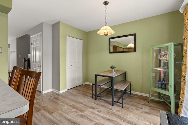 dining room featuring light hardwood / wood-style flooring