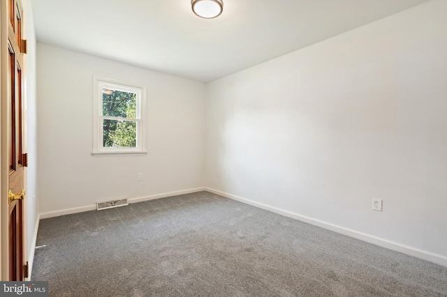 unfurnished room featuring carpet floors