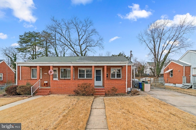 bungalow with a front yard