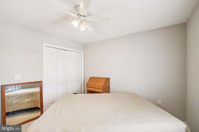 bedroom with a closet and ceiling fan