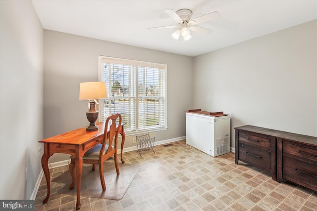 office area with ceiling fan