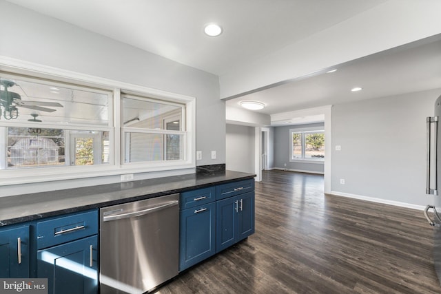 kitchen with blue cabinetry, stainless steel dishwasher, and dark hardwood / wood-style flooring