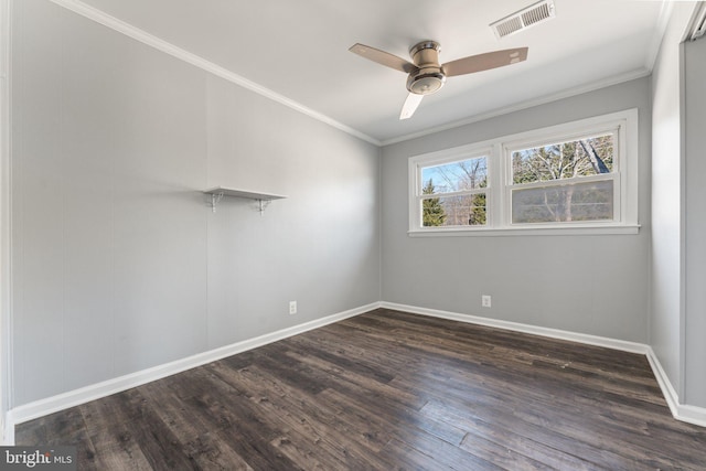 unfurnished room featuring ceiling fan, dark hardwood / wood-style flooring, and ornamental molding