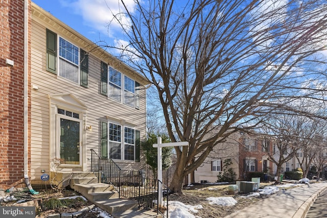 view of front of property featuring central AC unit