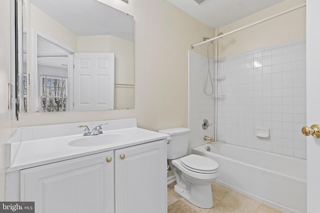 full bathroom with tiled shower / bath combo, vanity, tile patterned flooring, and toilet