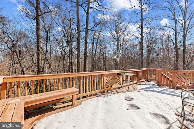 view of snow covered deck