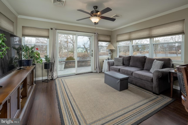 sunroom / solarium with ceiling fan