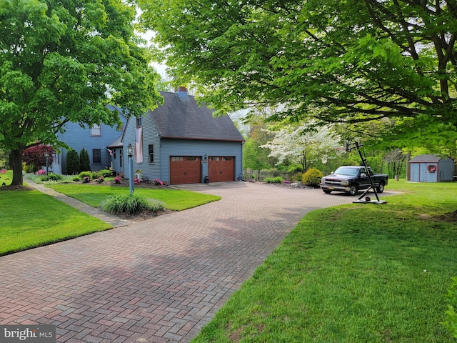 view of home's exterior featuring a yard and a garage