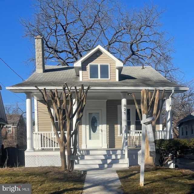 bungalow-style home featuring covered porch