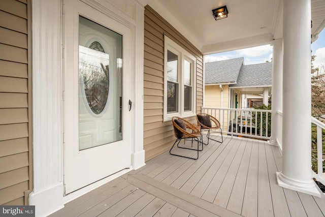 wooden deck with a porch