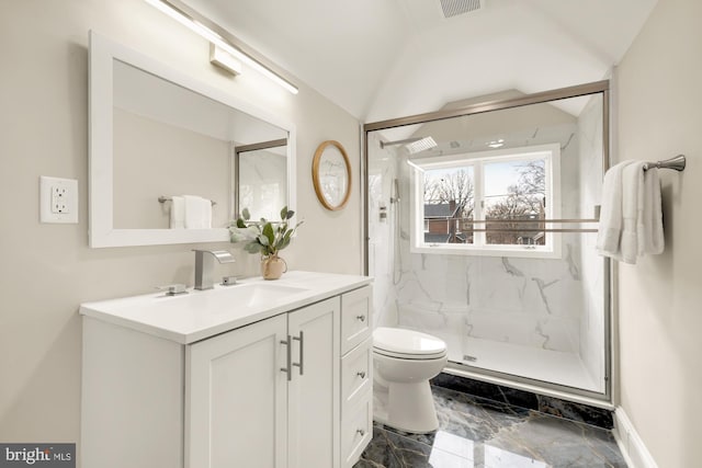 bathroom with vanity, an enclosed shower, vaulted ceiling, and toilet