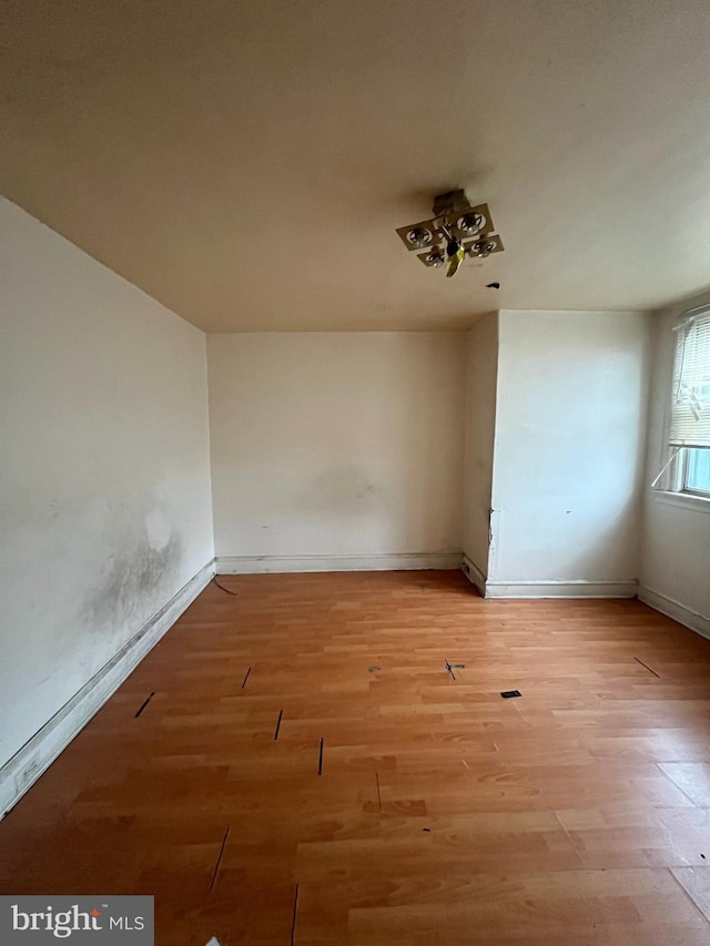 unfurnished room featuring light hardwood / wood-style flooring