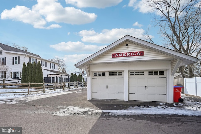 view of snow covered garage