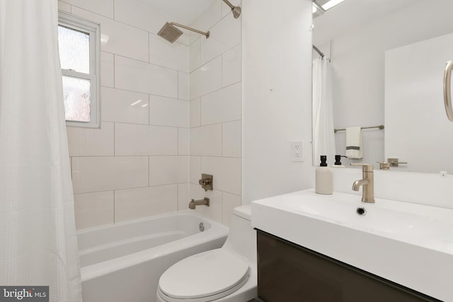 full bathroom featuring vanity, toilet, and shower / tub combo