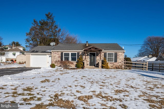 view of front of home with a garage