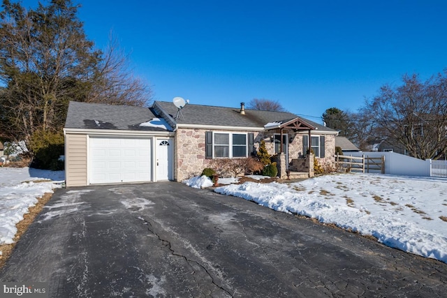 single story home with a garage