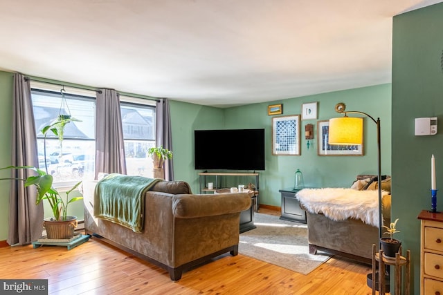 bedroom with light wood-type flooring