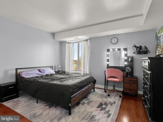 bedroom featuring dark hardwood / wood-style floors