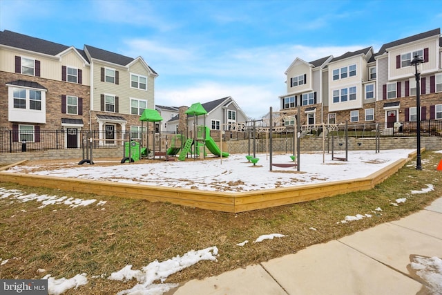 view of snow covered playground