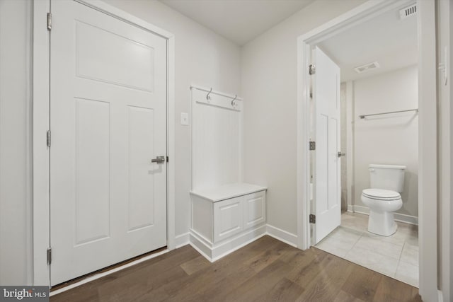 mudroom with hardwood / wood-style floors