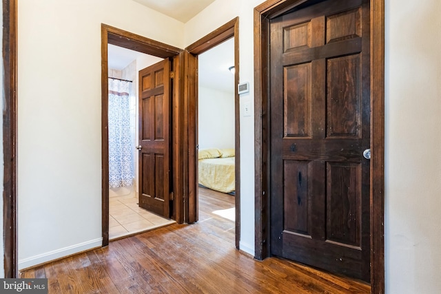 corridor featuring light wood-type flooring