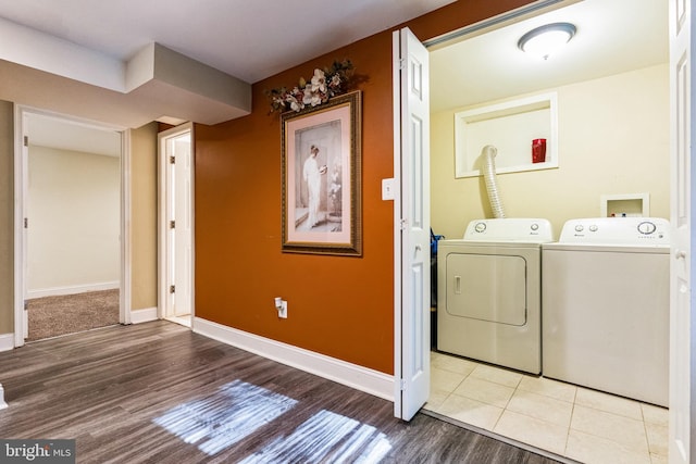 laundry room with tile patterned floors and washer and dryer