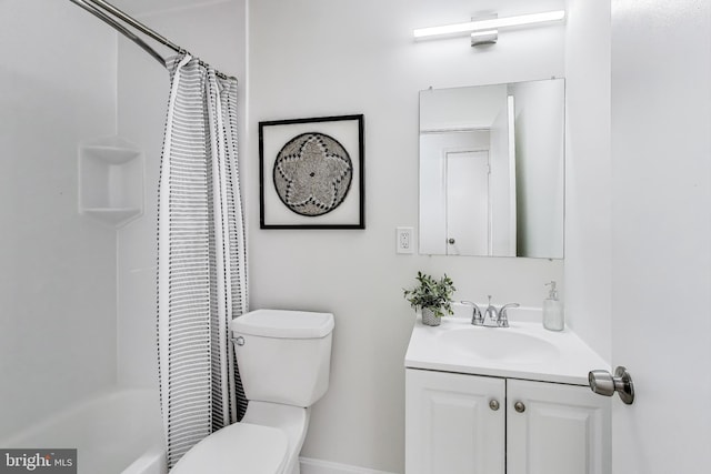 full bath featuring vanity and toilet