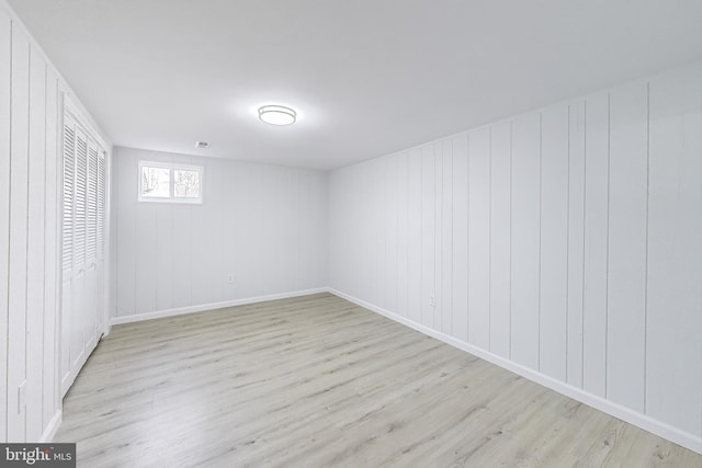 spare room with light wood-style flooring