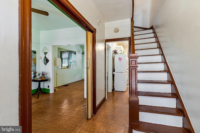 772 Columbia Rd NW, Washington, DC 20001 - stairway featuring baseboards
