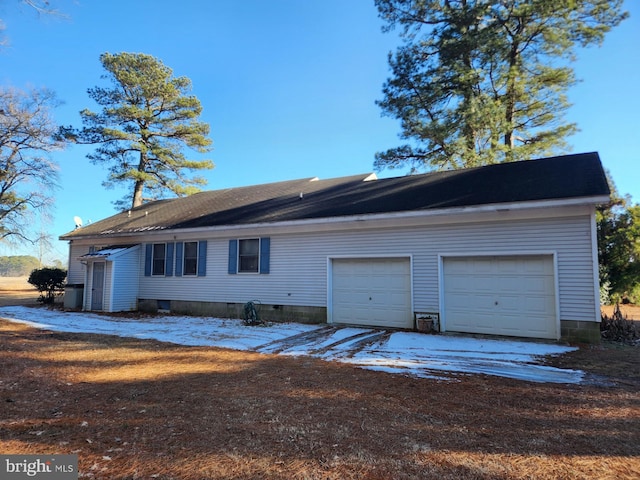 exterior space featuring a garage