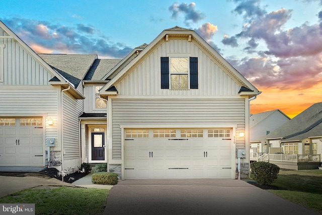 view of front of property with a garage