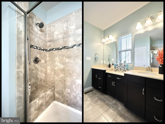 bathroom featuring tiled shower and vanity