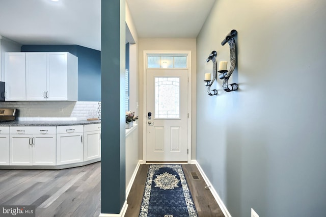 doorway featuring light hardwood / wood-style flooring