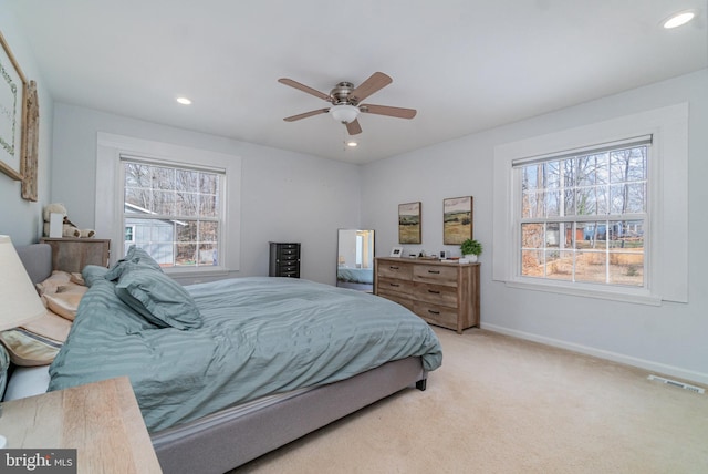 carpeted bedroom featuring ceiling fan