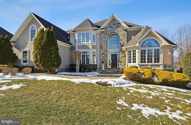 view of front property with a yard