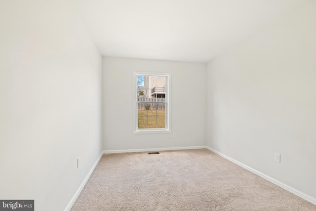 view of carpeted spare room