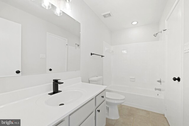 full bathroom with vanity, shower / bathing tub combination, tile patterned floors, and toilet