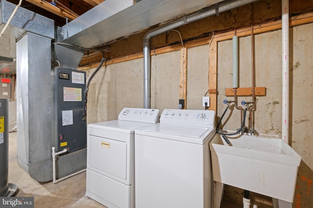 laundry room with sink and independent washer and dryer