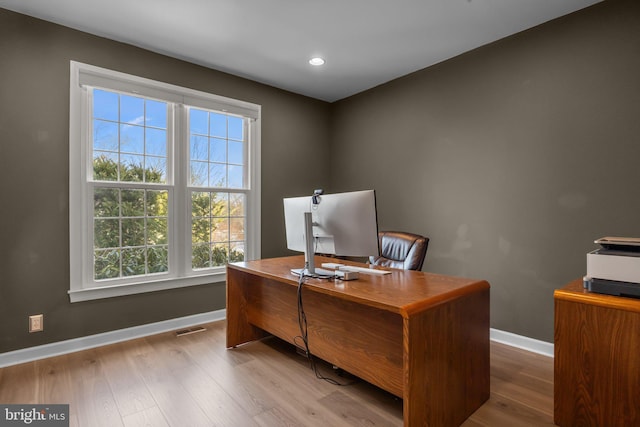 home office featuring light wood-type flooring