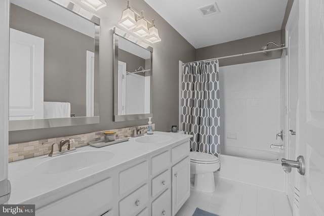 full bathroom with vanity, toilet, shower / tub combo, and backsplash